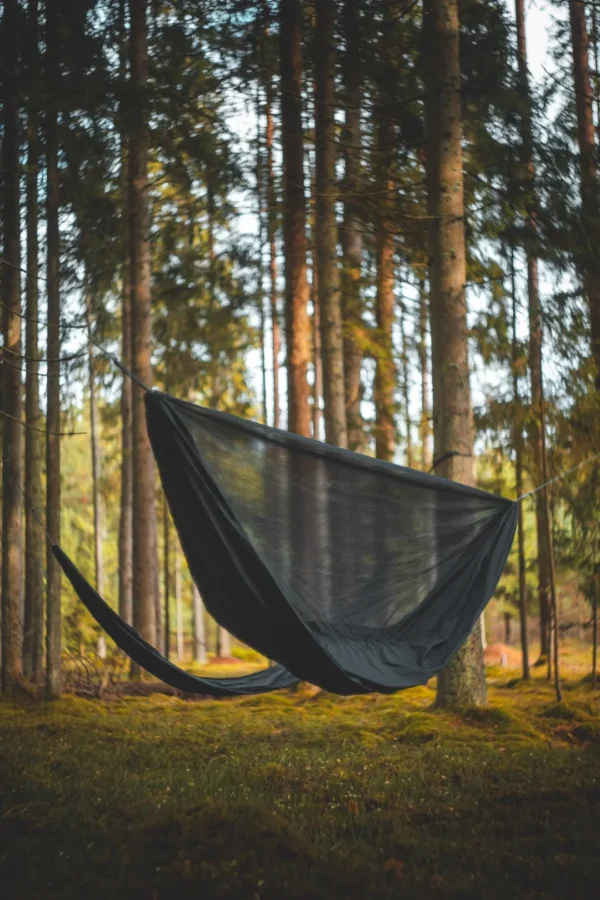 need for trees hammock with integrated insect net. Suspended on nft whoopie slings