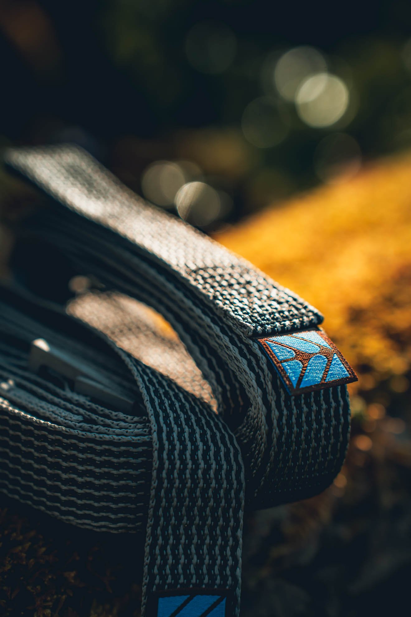close-up of hammock strap webbing with stitched label and texture detail