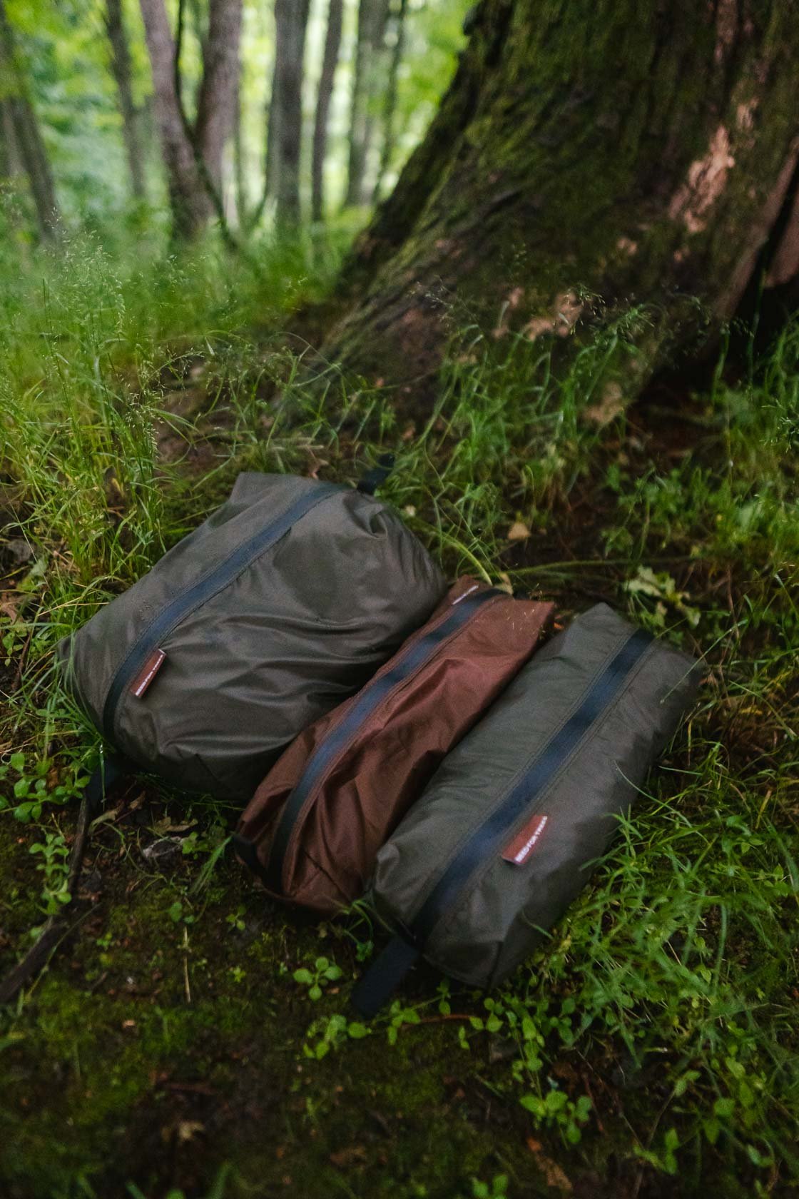 Olive green silpoly packing pod with waterproof zipper for organizing camping and hammock gear